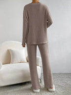 Women's ribbed knit V-neck lounge set by Plush Fashion Hub, two-piece matching outfit with comfortable, soft fabric and relaxed fit.