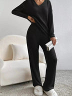 Women's ribbed knit V-neck lounge set by Plush Fashion Hub, two-piece matching pant set for comfortable casual wear.