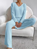 Women’s ribbed knit V-neck lounge set by Plush Fashion Hub, featuring a comfortable two-piece matching pant and top set.