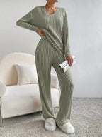 Women's ribbed knit V-neck lounge set by Plush Fashion Hub, featuring a comfortable two-piece matching outfit with relaxed fit.