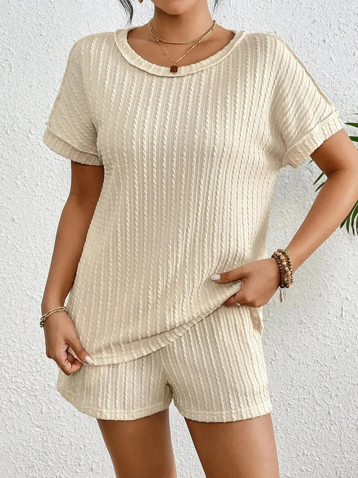 Women's ribbed round neck lounge set by Plush Fashion Hub, soft two-piece pajama with top and shorts for comfortable sleepwear.