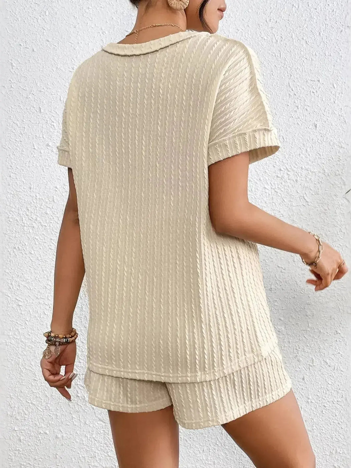 Women's ribbed round neck lounge set by Plush Fashion Hub, soft two-piece pajama with top and shorts for comfortable sleepwear.