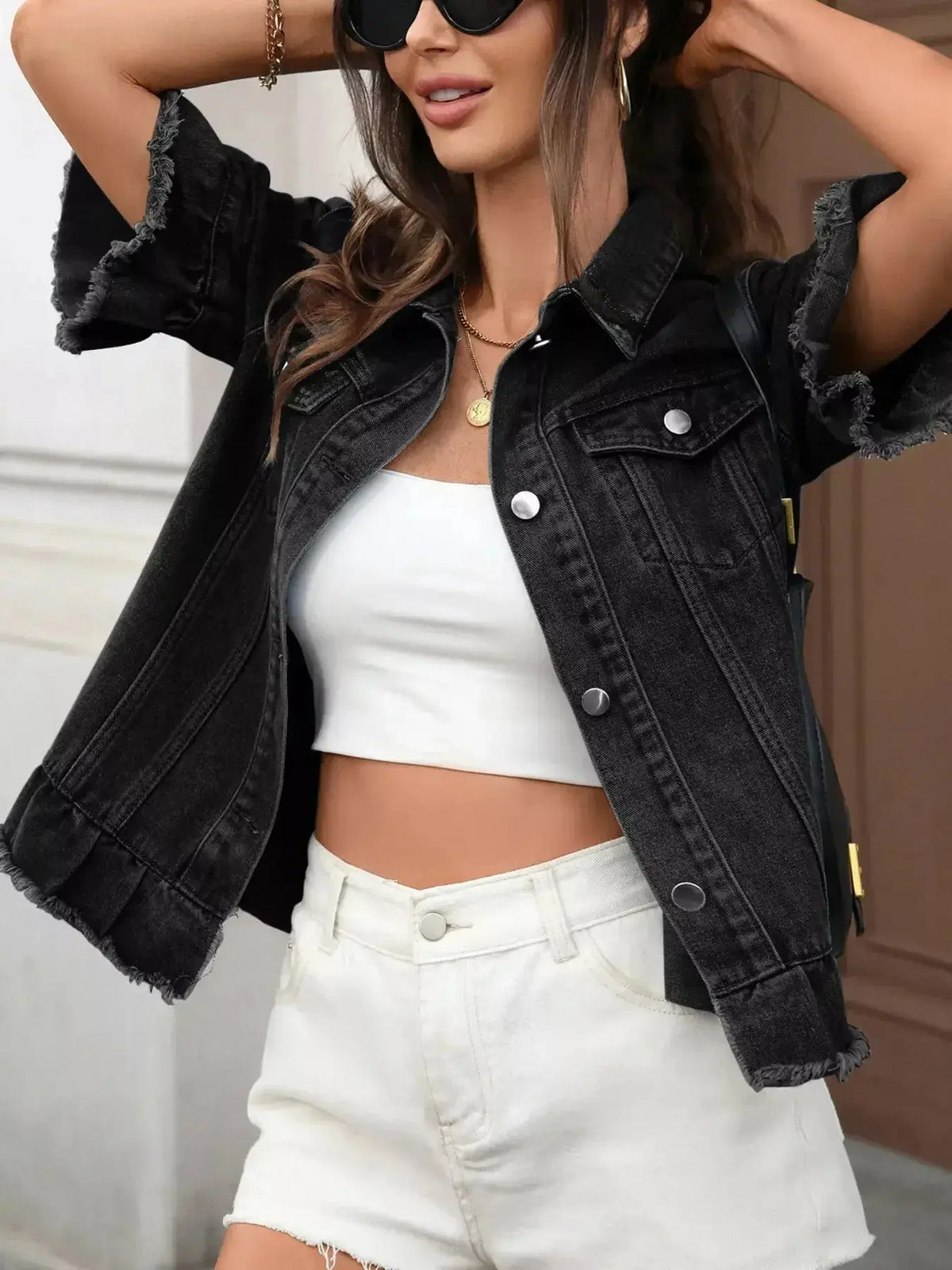 Women’s ruffled raw hem button-up denim jacket by Plush Fashion Hub, shown styled with casual outfit, featuring classic denim texture.