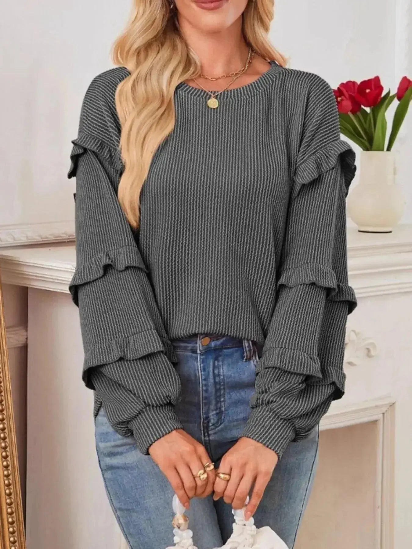 Women’s ribbed long sleeve sweatshirt with ruffled round neckline, stylish and cozy sweater by Trendsi.