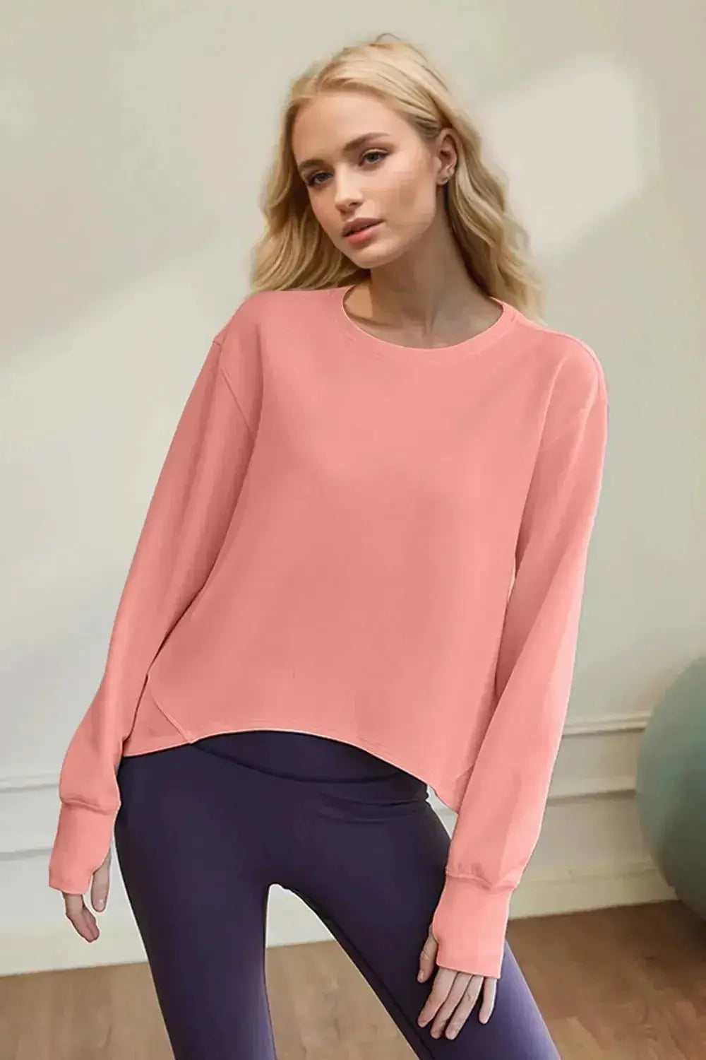 Women wearing Plush Fashion Hub's black scuba long sleeve round neck sweatshirt, minimalist casual shirt for everyday wear.