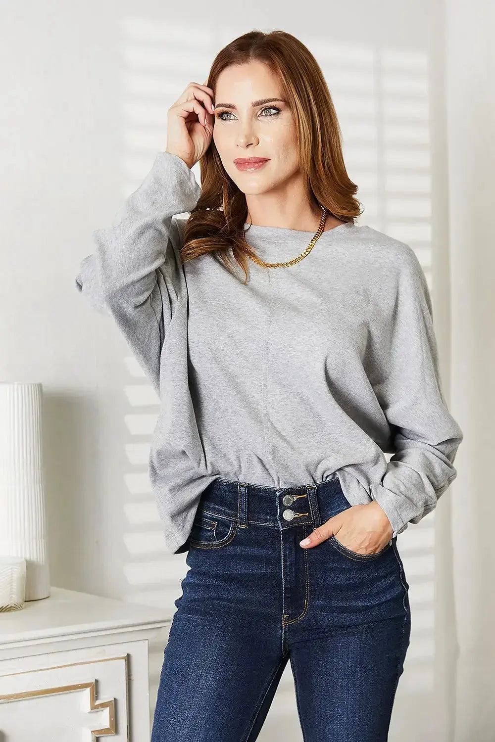 Women’s long sleeve round neck top with seam detail, comfortable everyday shirt by Trendsi.