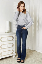 Women’s long sleeve round neck top with seam detail by Trendsi, a comfortable everyday shirt for casual wear.