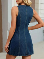 Women’s sleeveless denim mini dress with button front, casual summer shift style, by Trendsi, perfect for warm weather.