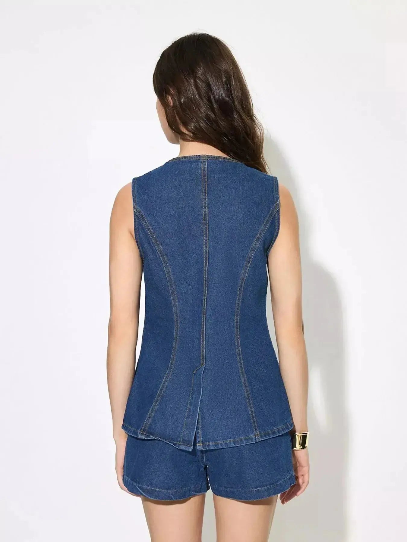 Women’s sleeveless denim button-up top and matching shorts set, trendy casual outfit by Trendsi.