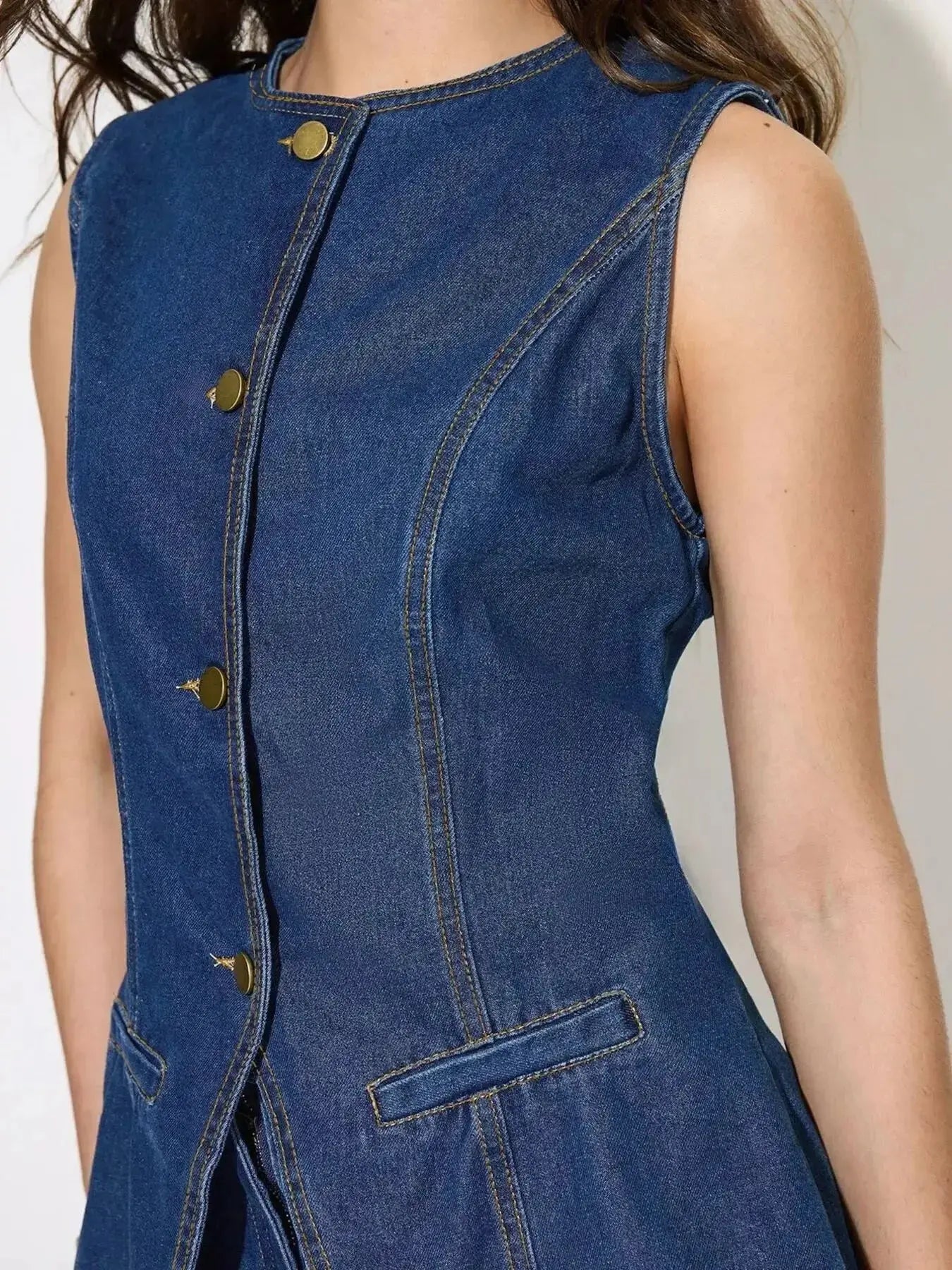Women’s sleeveless denim button-up top and matching shorts set by Trendsi, featuring casual summer style and classic denim fabric.