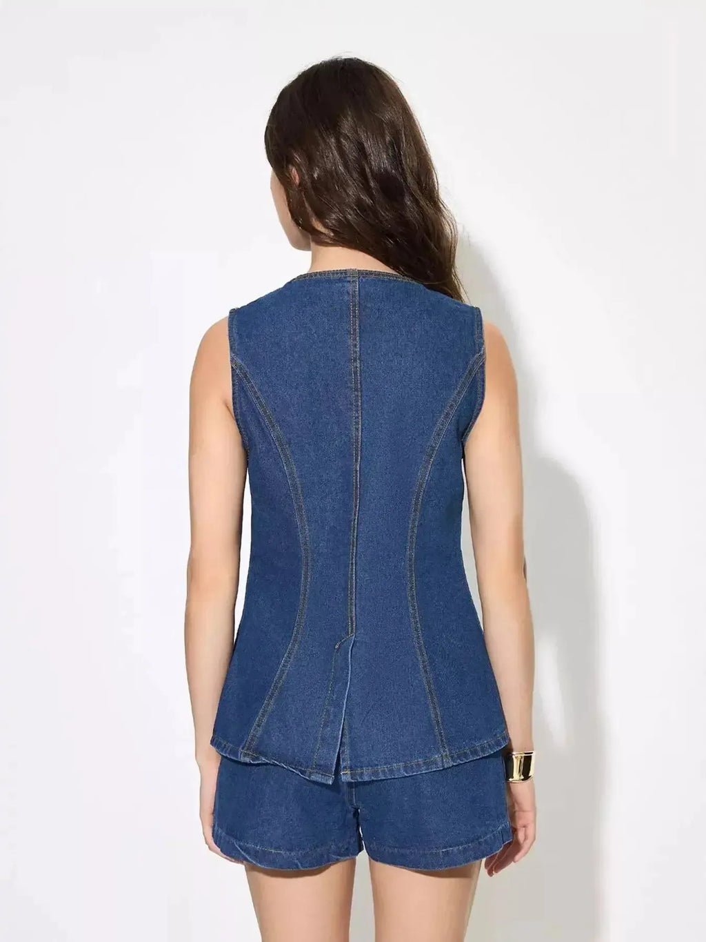 Women’s sleeveless denim button-up top and matching shorts set by Trendsi, featuring a stylish, casual summer look.