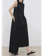 Women’s sleeveless irregular hem long dress in solid color by Plush Fashion Hub, stylish maxi dress with flowing design.
