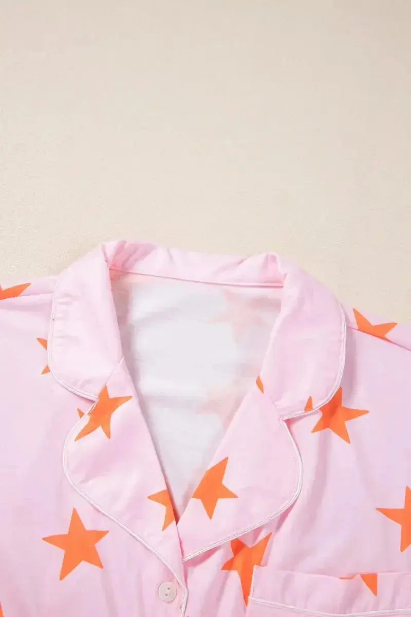 Women's star print short sleeve button-down pajama set by Trendsi, featuring a comfortable, stylish sleepwear design.