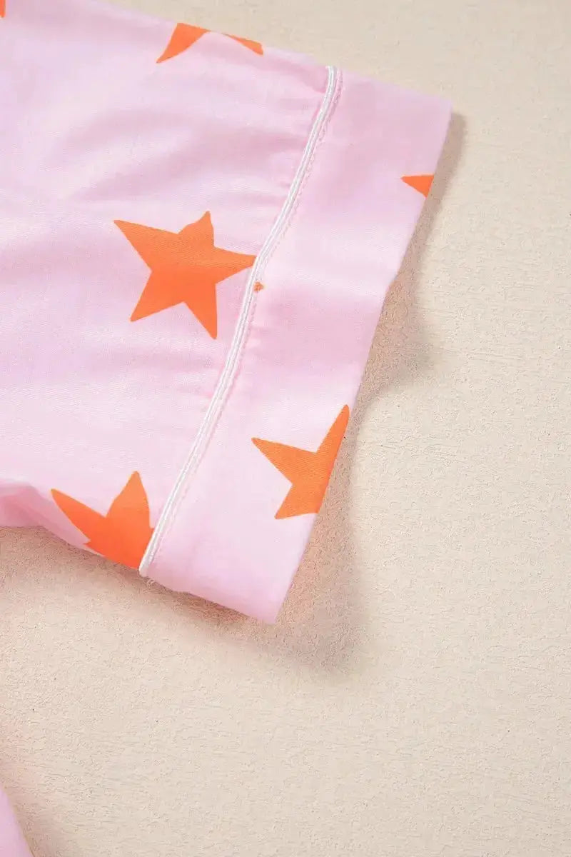 Women’s star print short sleeve button-down pajama set by Trendsi, featuring a comfortable and stylish sleepwear design.