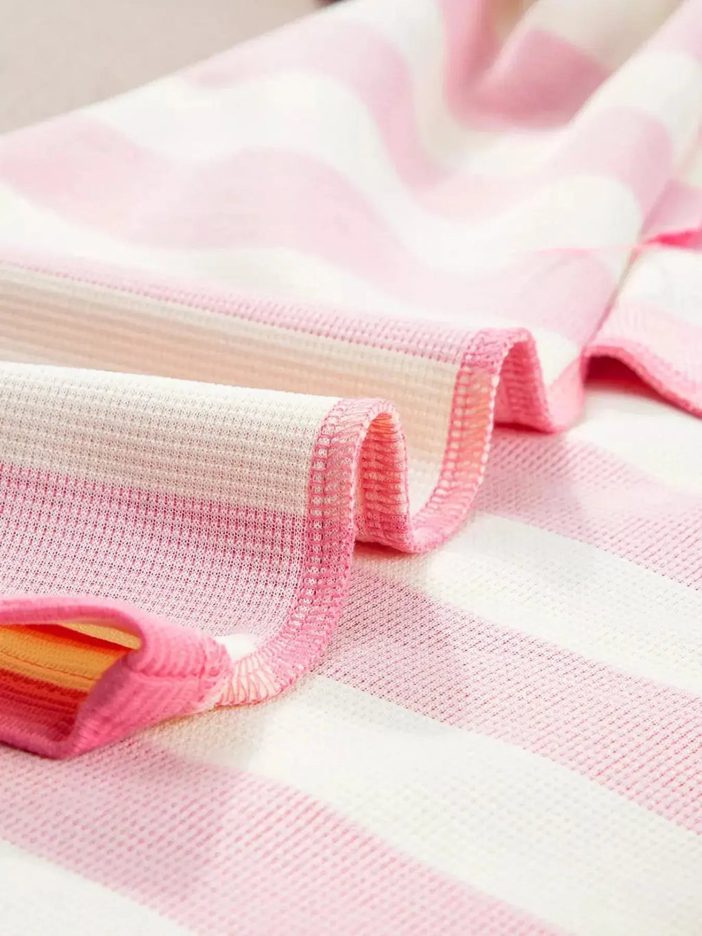 Women's striped cap sleeve shift dress with pockets by Trendsi, featuring a casual, comfortable fit and stylish design.