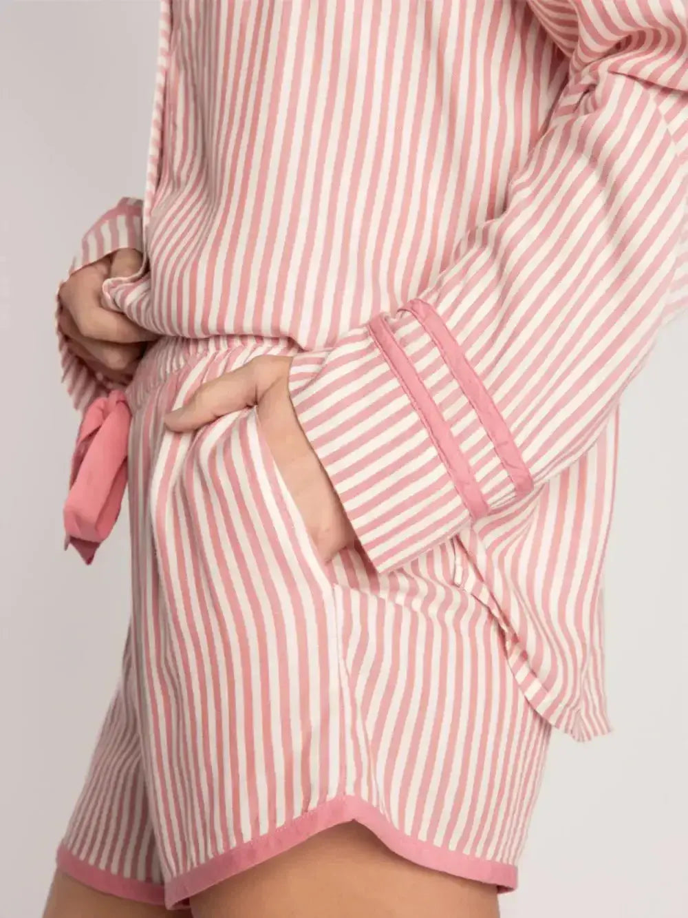 Women’s striped collared long sleeve top and shorts lounge set by Plush Fashion Hub, cozy pajamas for relaxing at home.