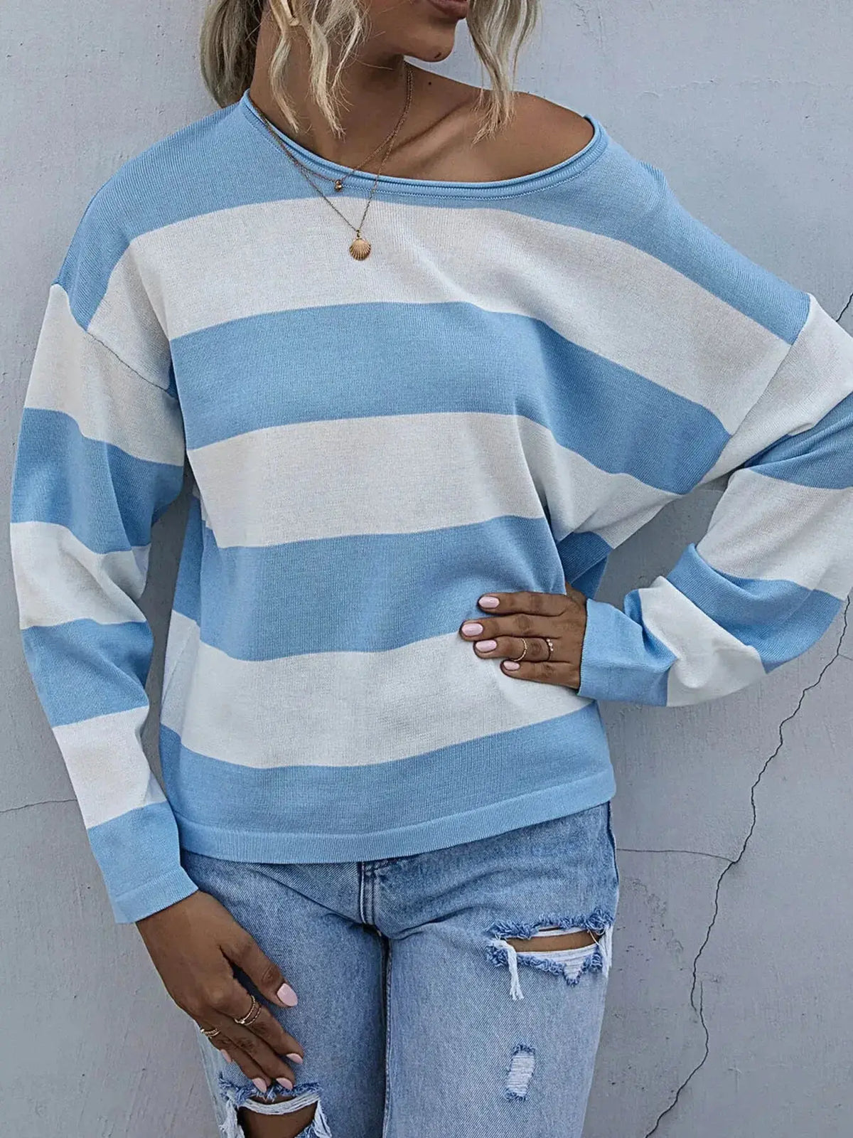 Women’s striped long sleeve knit casual crewneck shirt by Plush Fashion Hub, featuring a relaxed fit and classic stripe pattern.
