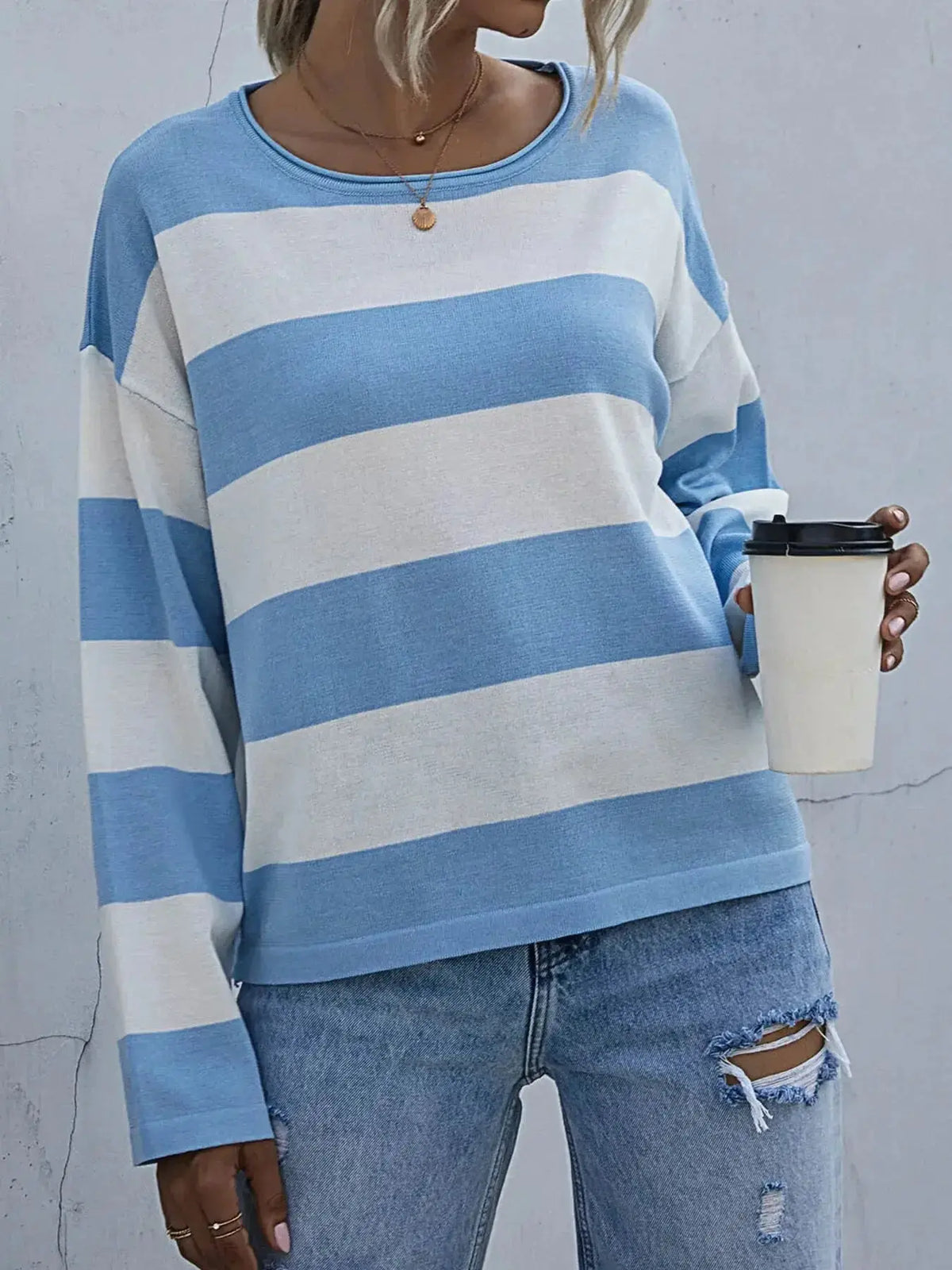 Women’s striped long sleeve knit casual crewneck shirt by Plush Fashion Hub, featuring a comfortable fit and classic striped design.