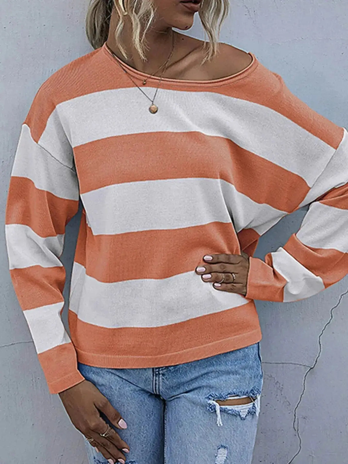 Women's striped long sleeve knit casual crewneck shirt by Plush Fashion Hub, featuring a comfortable fit and classic design.