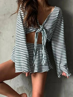 Women’s striped long sleeve pajama top and shorts set by Trendsi, featuring soft fabric and comfortable loungewear style.