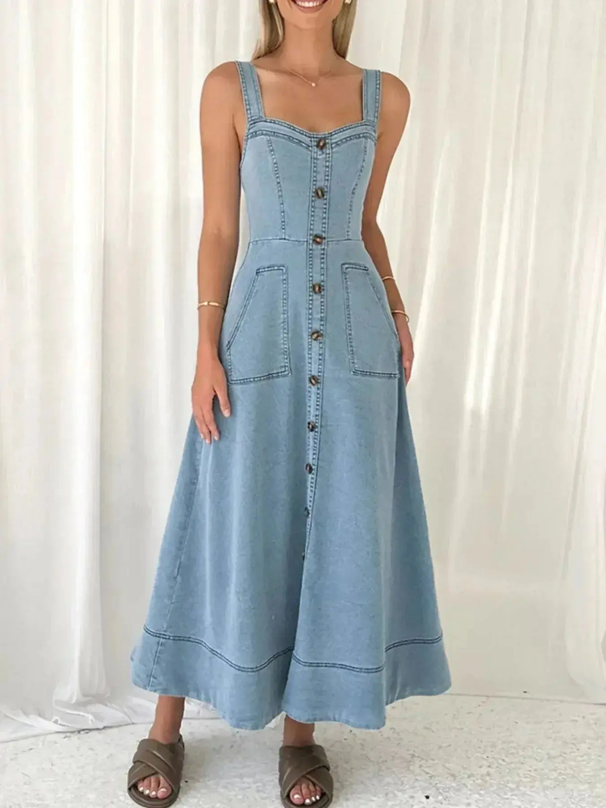 Blue denim women's sweetheart neck casual jean dress with pockets by Plush Fashion Hub, featuring a stylish and comfortable fit.