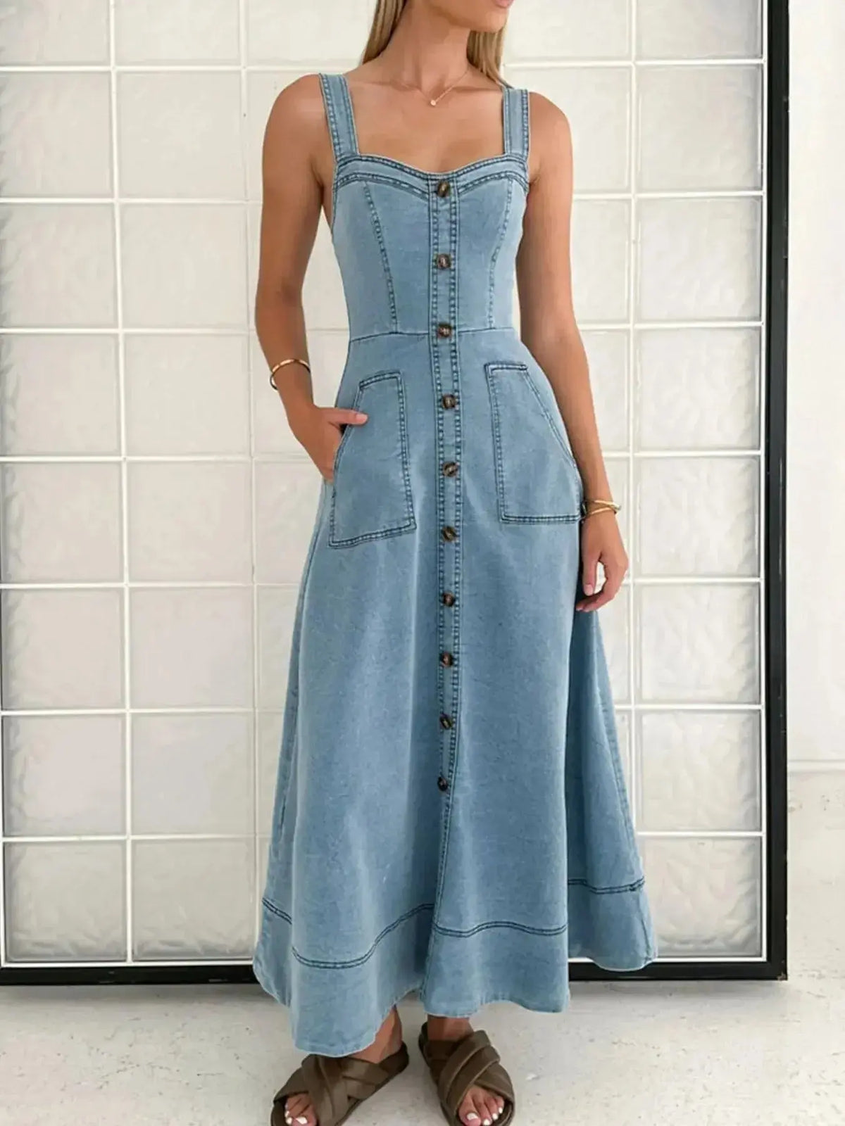 Women wearing plush blue denim sweetheart neck casual jean dress with pockets, stylish and comfortable for everyday wear.