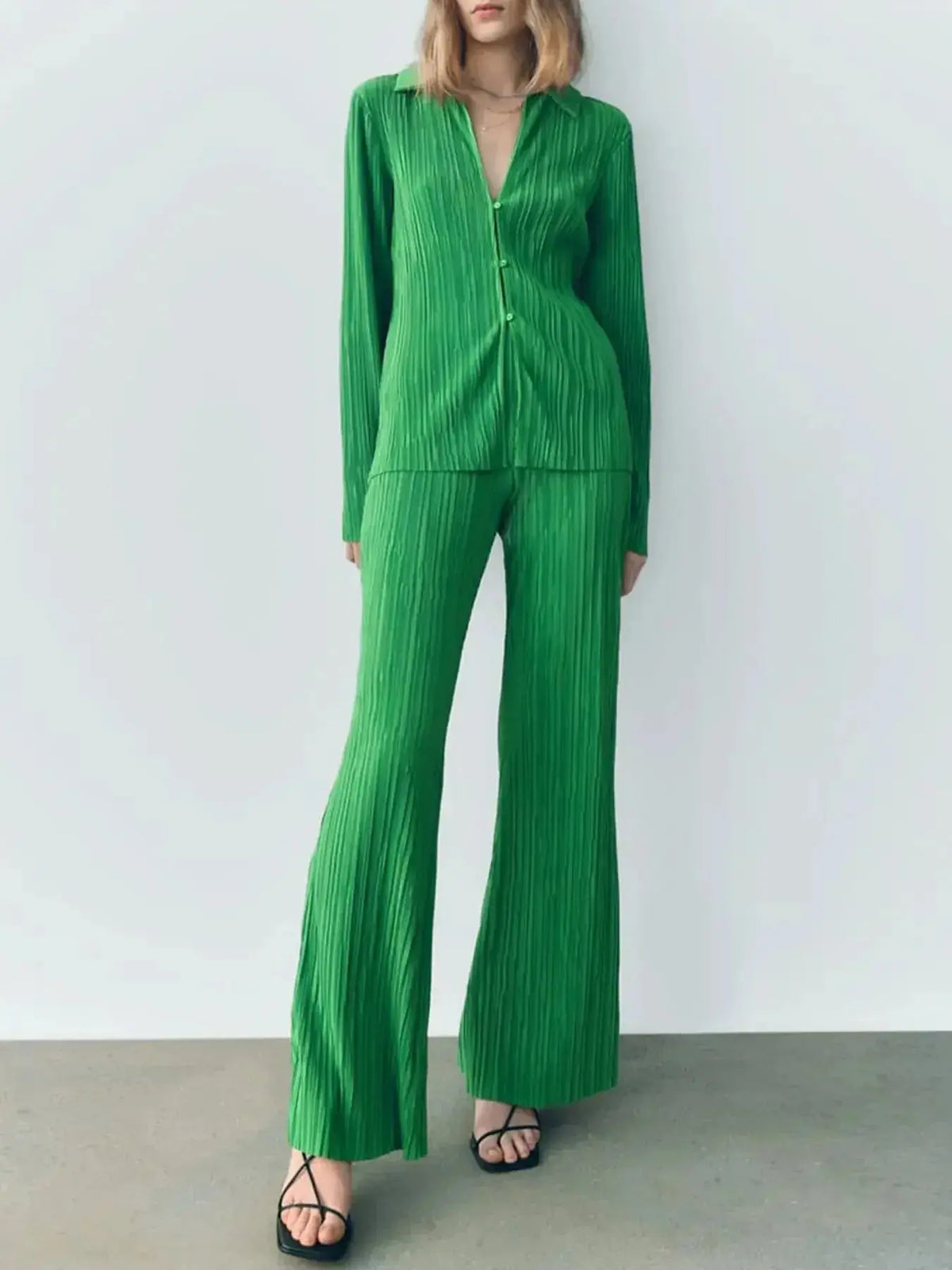 Women's textured long sleeve button-up lounge set pajamas by Plush Fashion Hub, cozy two-piece sleepwear for relaxation.