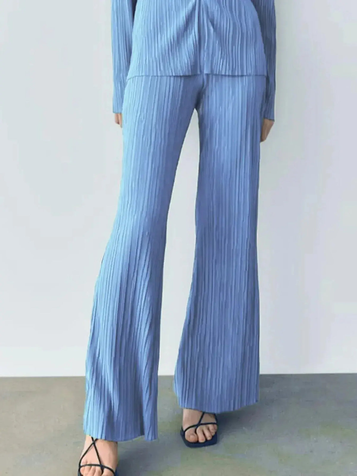 Women's textured long sleeve button-up lounge set pajamas by Plush Fashion Hub, cozy two-piece sleepwear with stylish design.