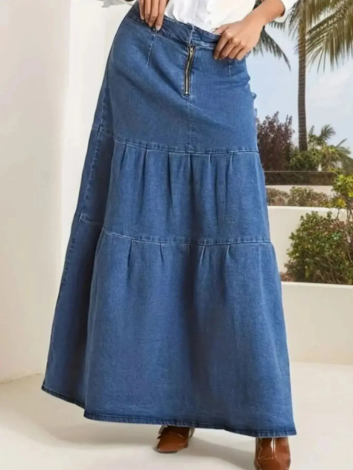 Women’s tiered maxi denim skirt with ruched zipper detail, stylish and trendy by Plush Fashion Hub.