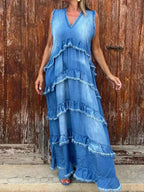 Women's tiered raw hem denim maxi dress by Plush Fashion Hub featuring casual ruffled design and long flowing silhouette.