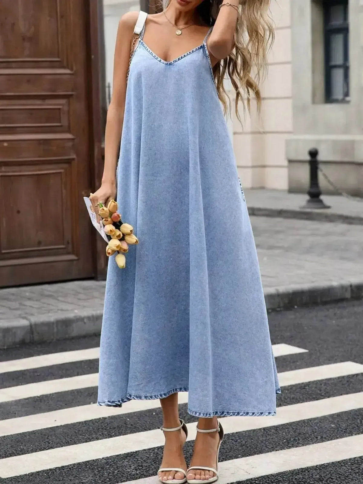 Women’s V-neck denim cami mini dress by Plush Fashion Hub, sleeveless casual cotton blend dress with V-neck and mini length.