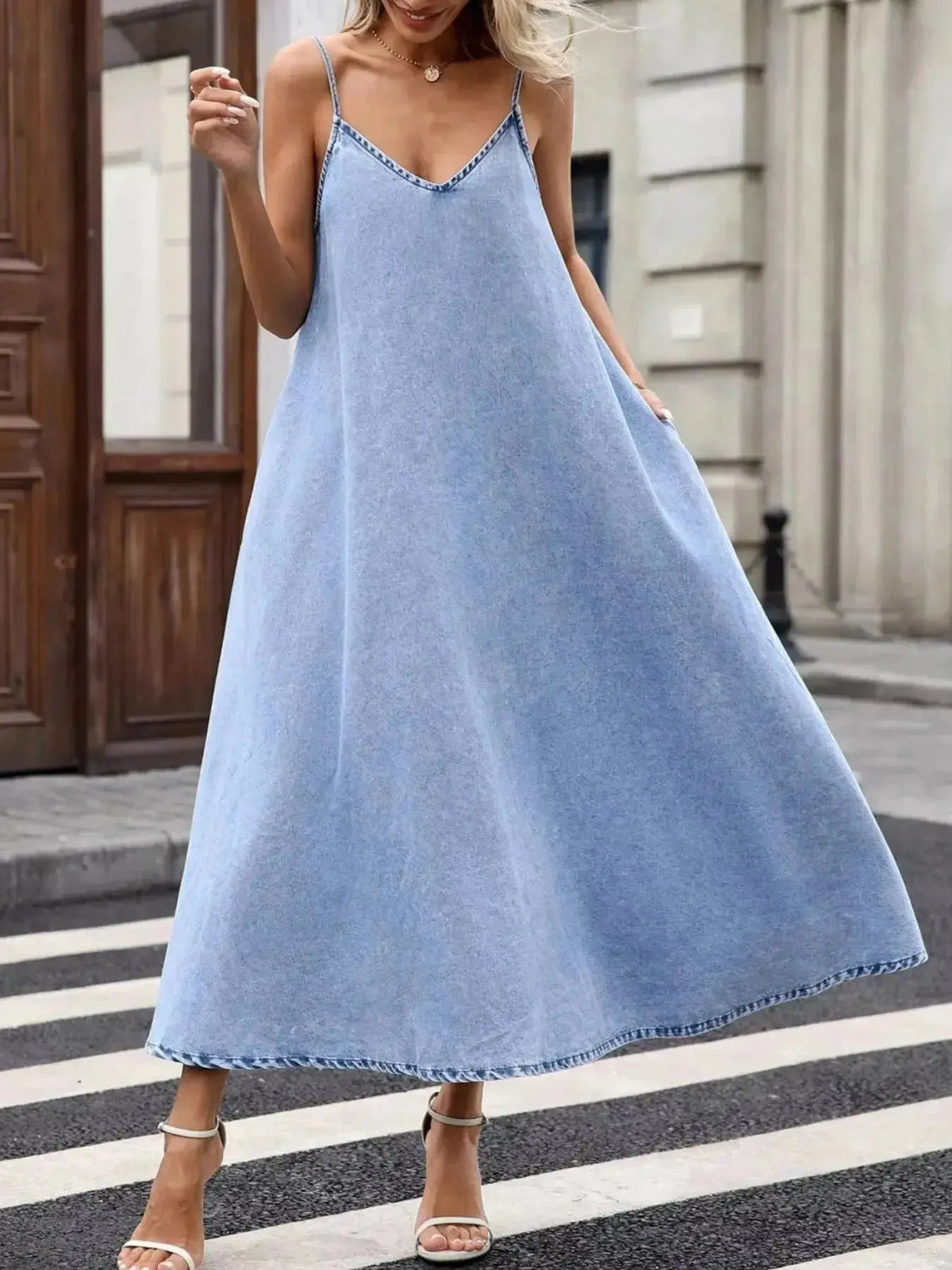 Women’s V-neck denim cami mini dress by Plush Fashion Hub, sleeveless casual dress made of cotton blend fabric, perfect for summer wear.