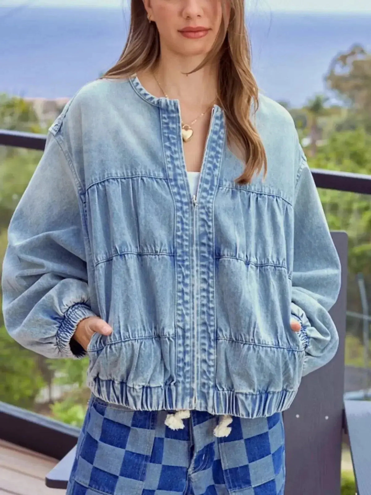 Women’s vintage washed zip-up denim jacket by Plush Fashion Hub, structured cotton blend fabric, casual and stylish for everyday wear.