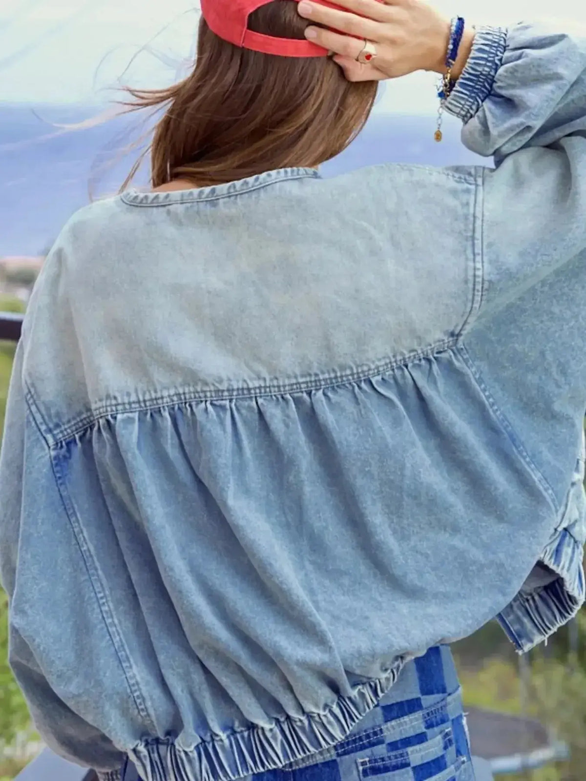 Women’s vintage washed zip-up denim jacket by Plush Fashion Hub, featuring structured cotton blend fabric and classic denim style.