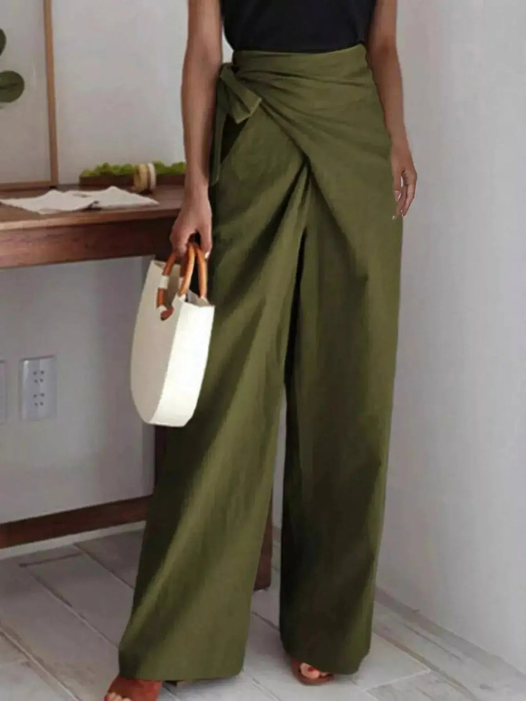 Elegant women's wrap waist wide-leg trousers from Plush Fashion Hub, flowing dress pants for a stylish, comfortable look.