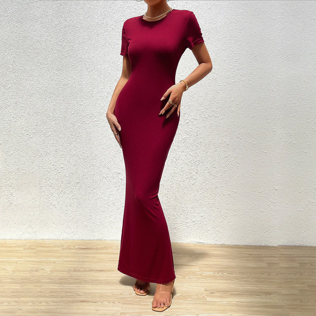 Women’s slim fit round neck dress in a solid color by Trendy Attic Store01, showcasing a stylish and elegant silhouette.