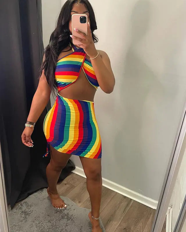 Sexy rainbow tie-dye halter bodycon mini dress for women, featuring vibrant colors and a fitted style, perfect for stylish occasions.