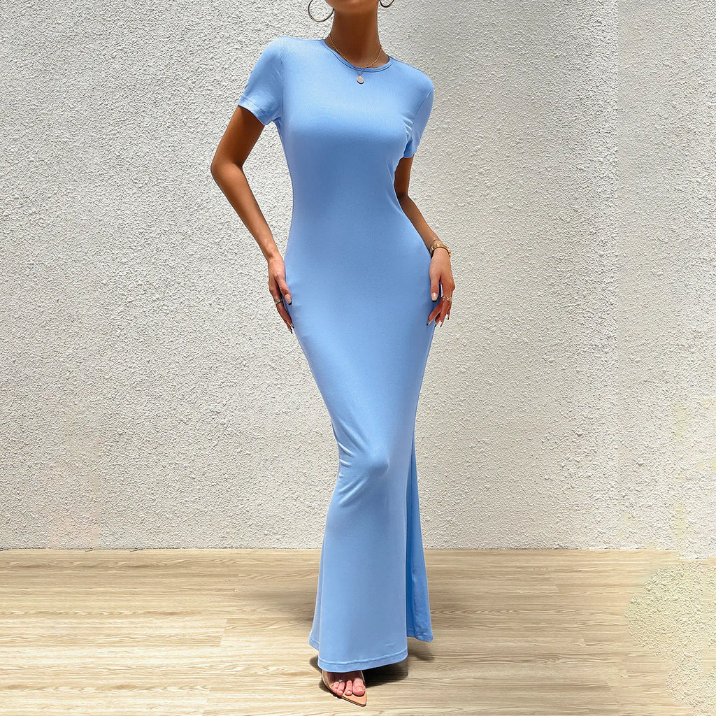 Elegant solid color slim fit round neck women's dress by Trendy Attic Store01, displayed on a hanger.