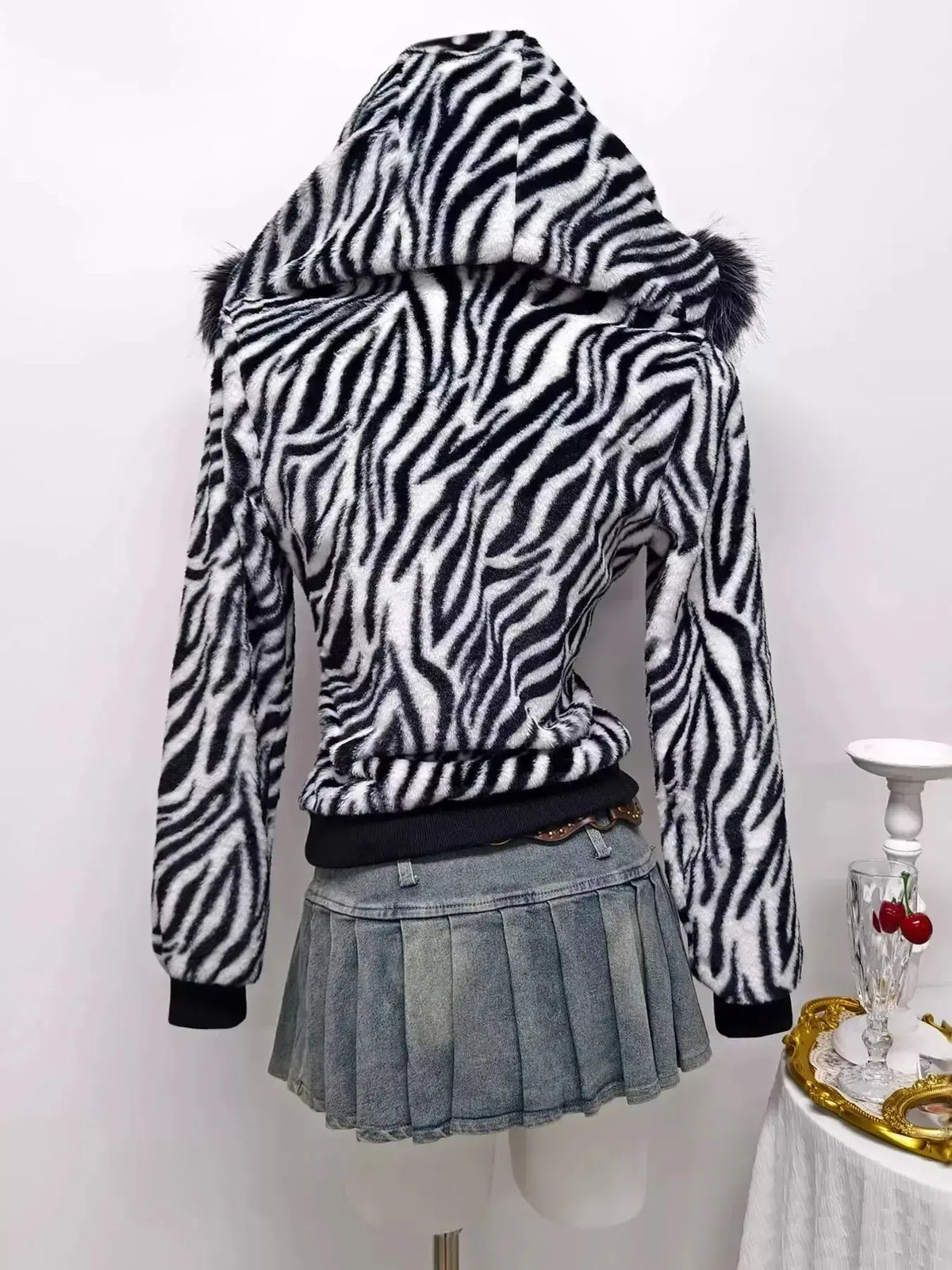 Zebra faux fur hooded zip-up jacket by Plush Fashion Hub featuring a stylish animal print and cozy design.