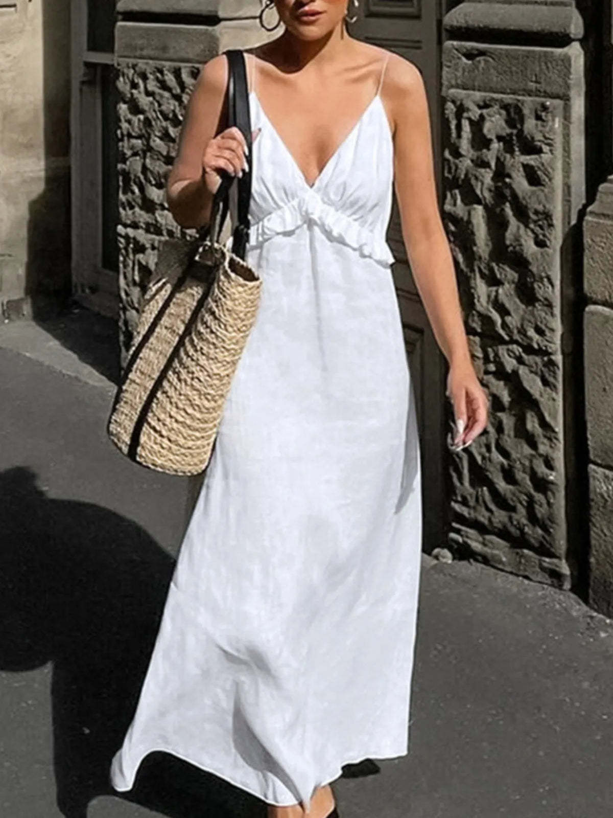 Flowy women's ruffled V-neck cotton maxi dress in boho style with a summer-friendly design, featuring a relaxed fit and ruffle details.
