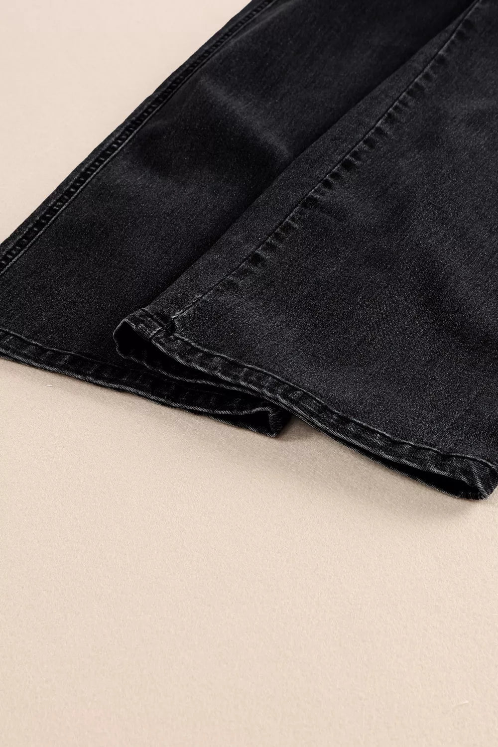 Plush Fashion Hub high-waisted wide-leg jeans with button fly and classic denim wash, displayed on a neutral background.