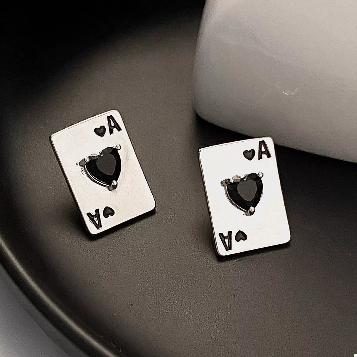 Silver Ace of Hearts stud earrings featuring poker card design from Plush Fashion Hub, displayed on a white background.
