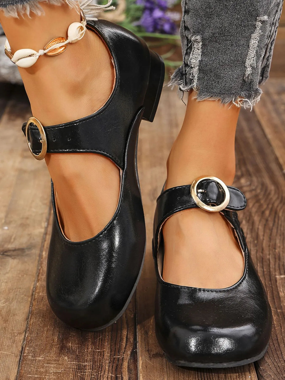 Women's buckle strap loafers by Trendsi, showcasing stylish leather shoes with buckle accents and comfortable slip-on design.