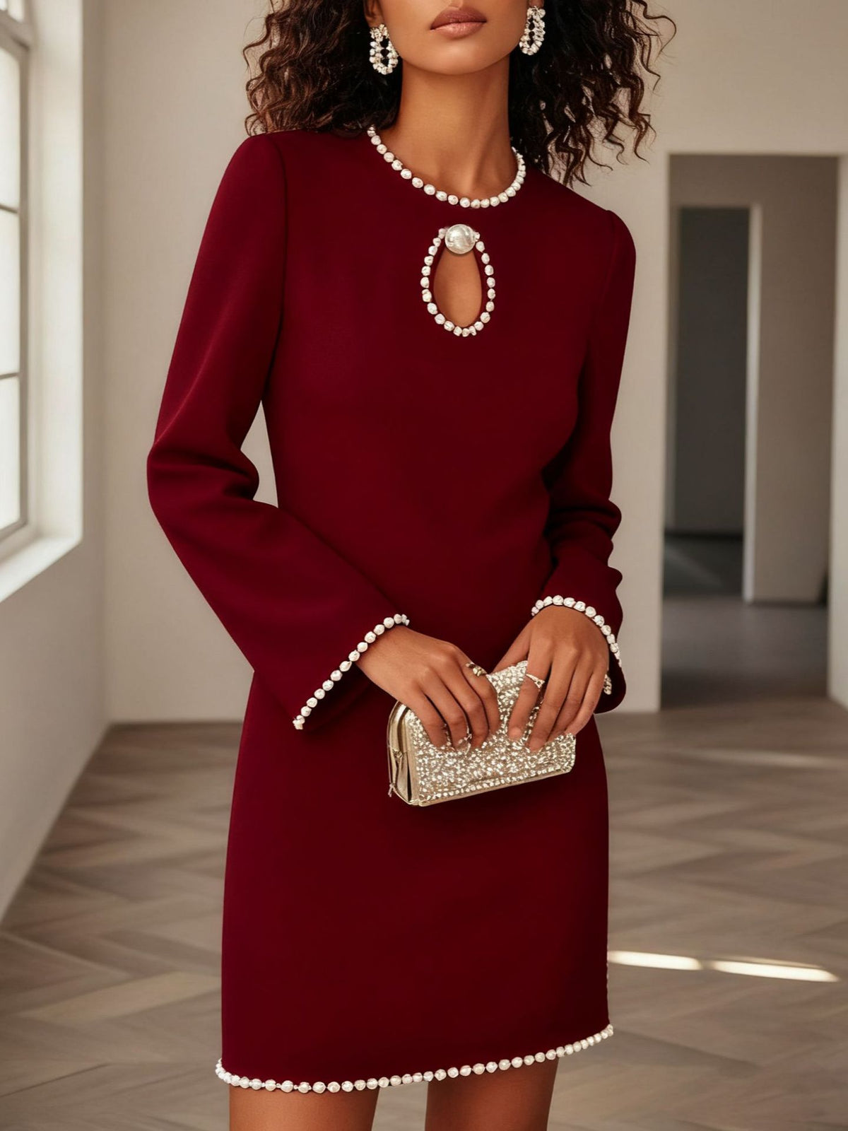 Elegant Plush Fashion Hub mini dress with a keyhole neckline and pearl trim, perfect for cocktail parties.