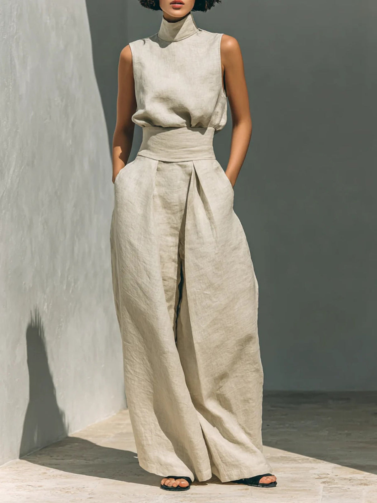 Sleeveless turtleneck top and matching pants set from Plush Fashion Hub, shown in a stylish, coordinated outfit.