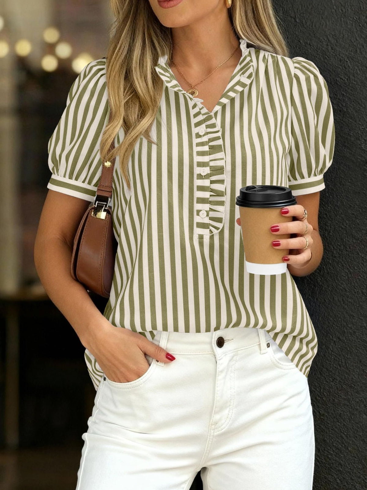 Women's striped puff sleeve blouse with ruffled details from Plush Fashion Hub, featuring a stylish, feminine design and vibrant pattern.