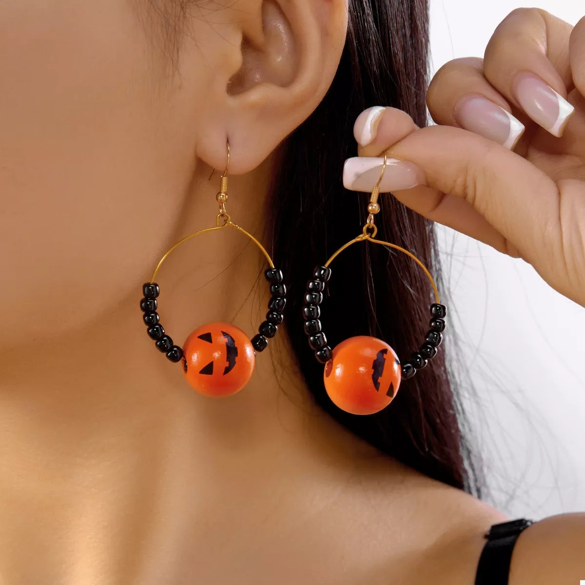 18K gold-plated Halloween bead earrings featuring spooky-themed beads and intricate design, perfect for festive accessories.