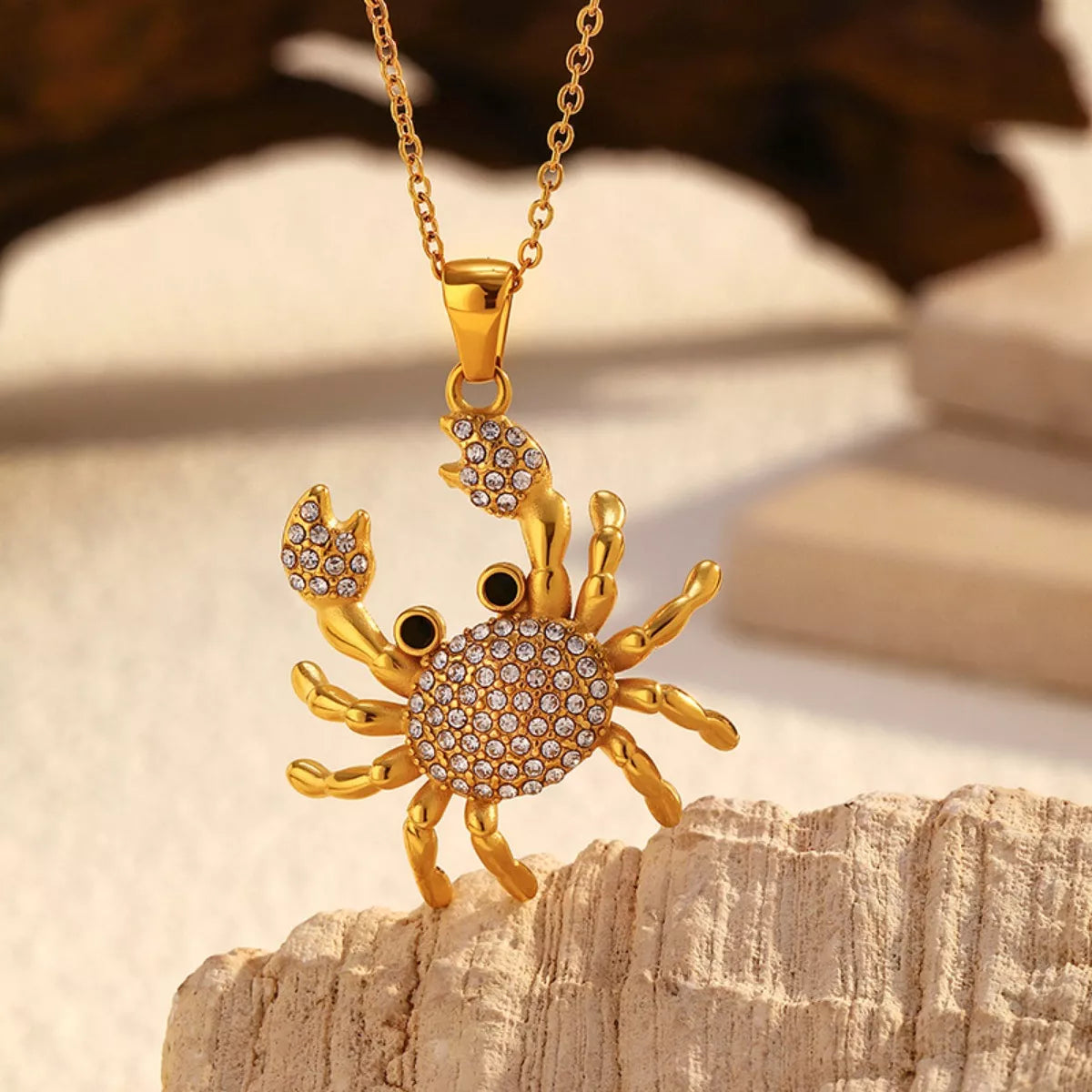 Gold-plated crab pendant necklace from Plush Fashion Hub featuring a detailed crab charm on a delicate chain.