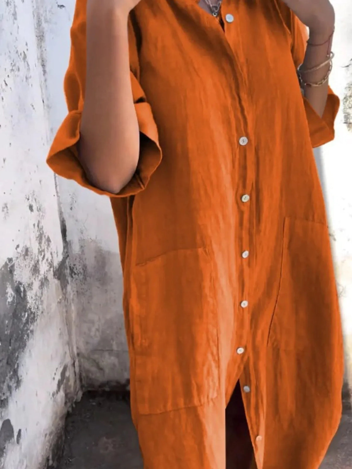 Plus size casual linen button-down shirt dress by Trendsi, featuring a relaxed fit and front buttons, perfect for everyday wear.