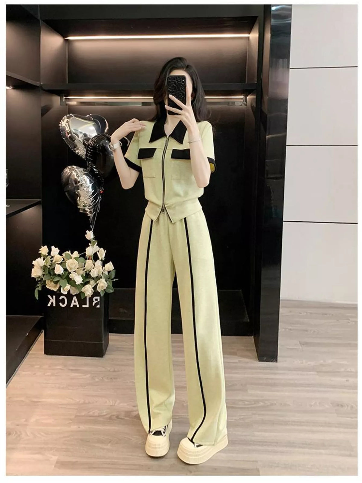 Contrast zip-up top and wide-leg pants set by Plush Fashion Hub, featuring a stylish two-piece outfit with a zip detail and relaxed fit.